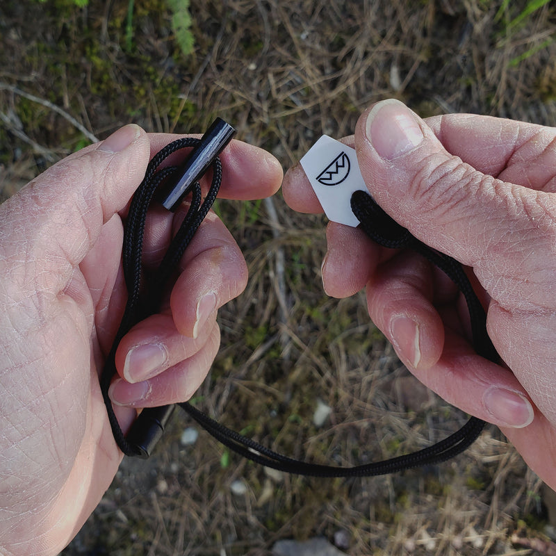 Load image into Gallery viewer, Emergency Fire Starter Necklace - Ultra Lightweight Mini Ferro Rod with Ceramic Striker & Neck Lanyard