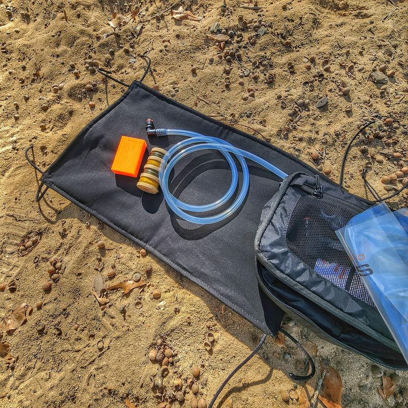 Load image into Gallery viewer, Woobie Hank: Insulated with USGI poncho-liner, serves as a large rag, knee pad, and adventure companion tool.
