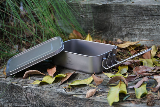 Reheat Over Fire. Same Box. 1200ml Titanium Bento · Airtight leakproof seal · Reheatable on open flame · 9 oz